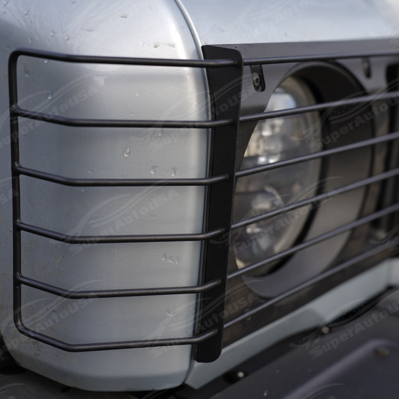 Visual comparison showing the exposed factory round headlight versus the rugged stainless steel guarded setup
