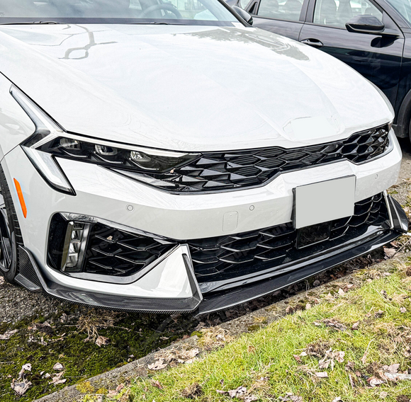 SuperAutoUSA aggressive styling carbon fiber front splitter for Kia K5 2025+.
