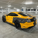 Underside of the carbon fiber fenders showing reinforced mounting points and resin finish