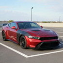 Uninstalled 4-piece carbon fiber print side skirts kit laid out