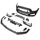 A Ford Mustang in a showroom with the new Dark Horse style bumper