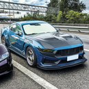 Sleek SuperAutoUSA carbon fiber hood installed on a 2025 Ford Mustang