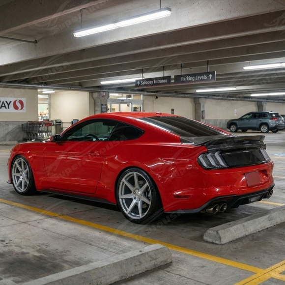2022 Ford Mustang in motion highlighting the sleek real carbon fiber rear end