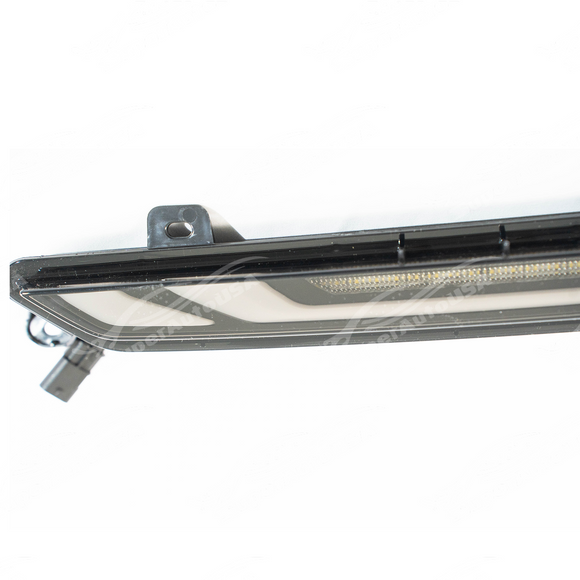 Precision flush fitment of the clear LED light on a 2025 Mustang trunk line