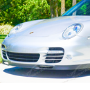 Underside view of the front lip showing mounting points