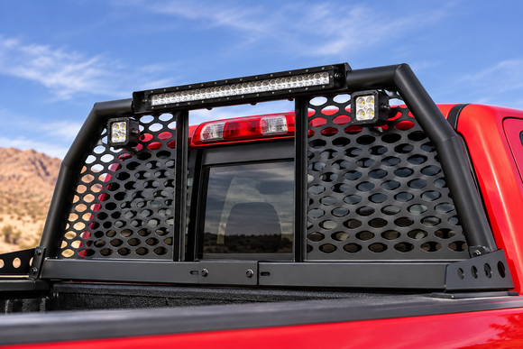 Industrial-grade steel roll bar headache rack installed on a lifted RAM 2500 Heavy Duty Cummins