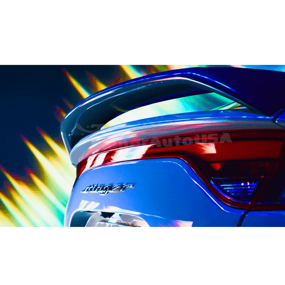 Dynamic shot of the Kia Stinger equipped with the Scorpion GT Celestial Blue Metallic Rear Spoiler Wing, highlighting the rear lower bumper wing lip diffuser performance and extension addon with ribs for superior aerodynamics