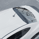 Top-down view highlighting the sleek aerodynamic curvature of the Carbon Print roof visor