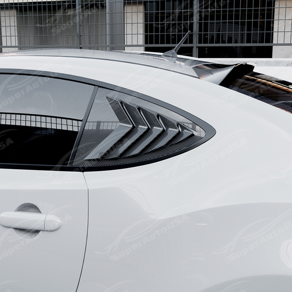 Side perspective highlighting the aerodynamic profile of the carbon print rear quarter trim