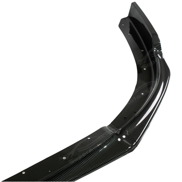 Showing the high-reflectivity clear coat on the SuperAutoUSA carbon fiber print STI front lip