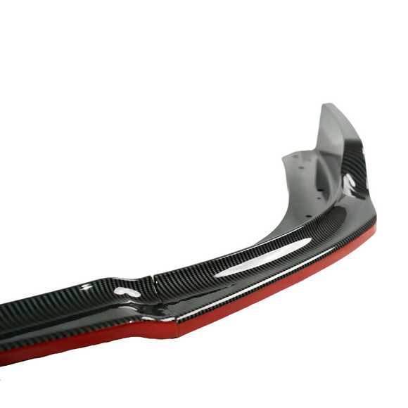 2009 Subaru WRX STI in motion highlighting the aerodynamic SuperAutoUSA red-accented carbon print lip