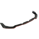 Close-up of the carbon fiber print weave texture and precision red painted edge