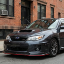 Aggressive "Time Attack" style with red pinstripe and carbon print on a black STI