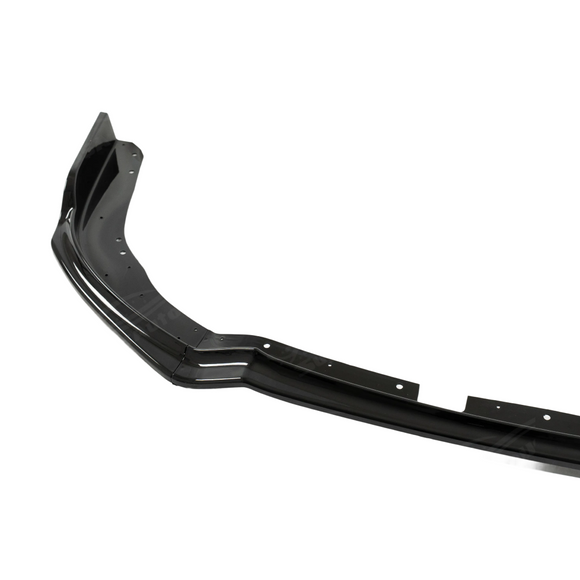 Close-up of the mirror-like gloss black finish on the 2011-2014 Subaru STI front lip