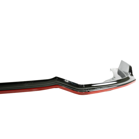Standalone view of the uninstalled gloss black front bumper splitter with red trim