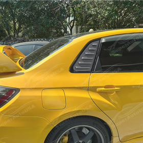 Side perspective highlighting the aerodynamic profile of the carbon print rear quarter trim