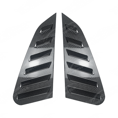 Detailed shot of the high-definition carbon fiber print weave on the GV window louvers