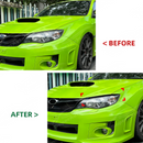 Wide shot of a modified Subaru STI featuring headlight eyelids and a front lip splitter