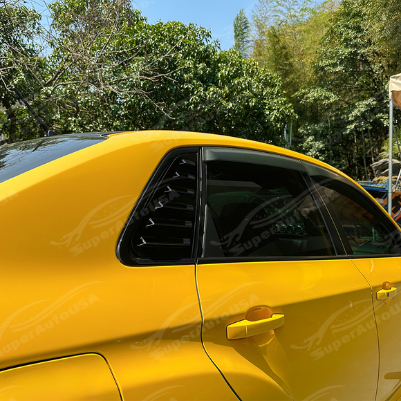 Pair of gloss black rear passenger window louvers installed on a 2011 Subaru WRX STI GV sedan