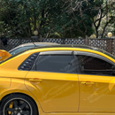 Direct side profile of the gloss black rear quarter window louvers for 2008-2014 Subaru WRX sedan
