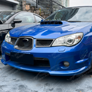 Front perspective highlighting the exotic performance look of the carbon print grill frames