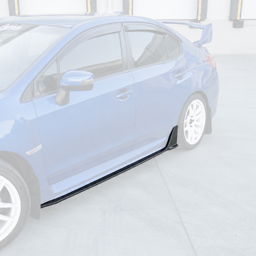 Real 3K carbon fiber side skirt extensions with rear winglets installed on a 2018 Subaru WRX STI VA