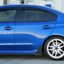 Track-inspired carbon fiber winglet side steps accenting a Crystal White Pearl Subaru VA sedan