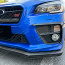 Aggressive carbon print fog light accent trim installed on a 2015 Subaru WRX STI