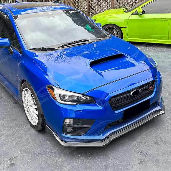 Sporty carbon fiber print JDM lip providing a race-inspired look on a World Rally Blue VA