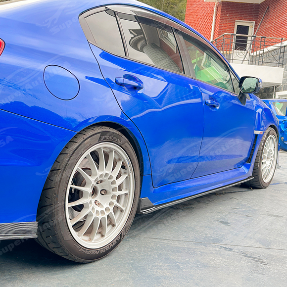 Aggressive carbon print JDM style side skirts installed on a 2017 Subaru WRX STI