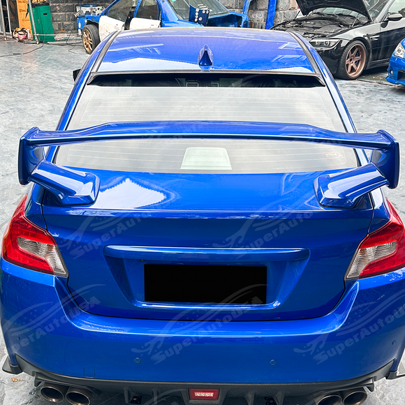 Complete rear-end view of a Subaru WRX featuring the gloss black window visor extension