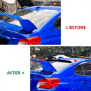 Gloss black roof visor providing a sporty contrast on a World Rally Blue Subaru STI