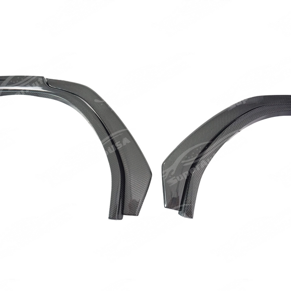 Carbon fiber fender flares integrated on a black Subaru WRX VB