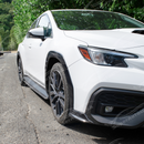 Uninstalled set of real carbon fiber car wheel arch fender flares