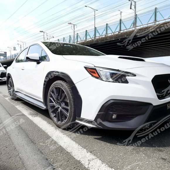 The uninstalled 2pc real carbon fiber front fender flares kit, highlighting the lightweight material and shape