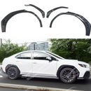 A dynamic shot of a Subaru WRX VB showcasing the performance-inspired design of the carbon fiber rear fender flares