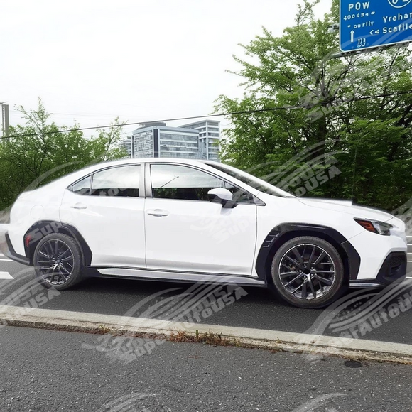 The uninstalled pair of real carbon fiber rear fender flares, highlighting the lightweight material and shape
