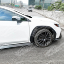 A side profile view of a Subaru WRX VB with the sleek carbon fiber rear fender flares installed