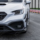 Aggressive carbon print front bumper canards installed on a 2023 Subaru WRX