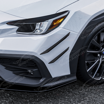 Subaru WRX VB in a high-speed corner highlighting the aerodynamic function of the canards