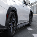 Low angle shot highlighting the aggressive ground-hugging profile of the VB side skirt extensions