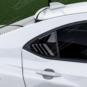 Sleek gloss black window louvers providing a race-inspired look on a 2024 Subaru WRX Limited