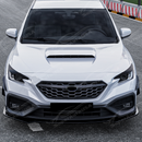 Wide shot of a modified 2024 Subaru WRX featuring headlight eyelids and a front lip splitter