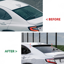 The completed high-performance look of a Subaru VB with a rear window visor and matching trunk spoiler