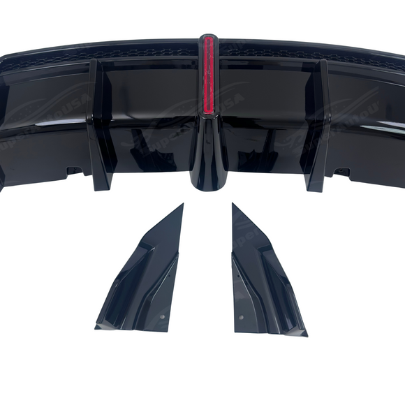 Underside perspective showing pre-drilled OEM bolt holes, mounting clips, and chassis bracket slots