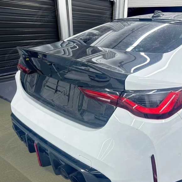 2024 BMW G22 430i xDrive carbon fiber trunk lid upgrade by SuperAutoUSA.
