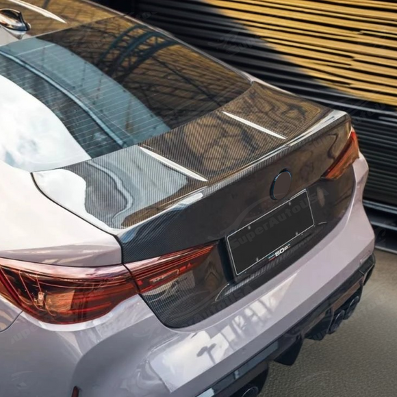 2023 BMW G22 M440i carbon fiber rear trunk lid by SuperAutoUSA.
