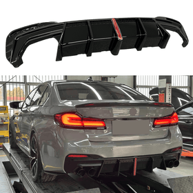 Fits BMW 530i Sedan 2017, 2018, 2019, 2020, 2021, 2022, 2023 rear bumper diffuser lips body kit with LED light by SuperAutoUSA.