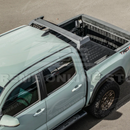 Full view of a 2017 Toyota Tacoma with an adjustable chase rack roll bar