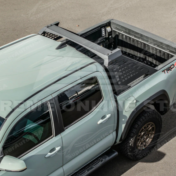 Full view of a 2017 Toyota Tacoma with an adjustable chase rack roll bar